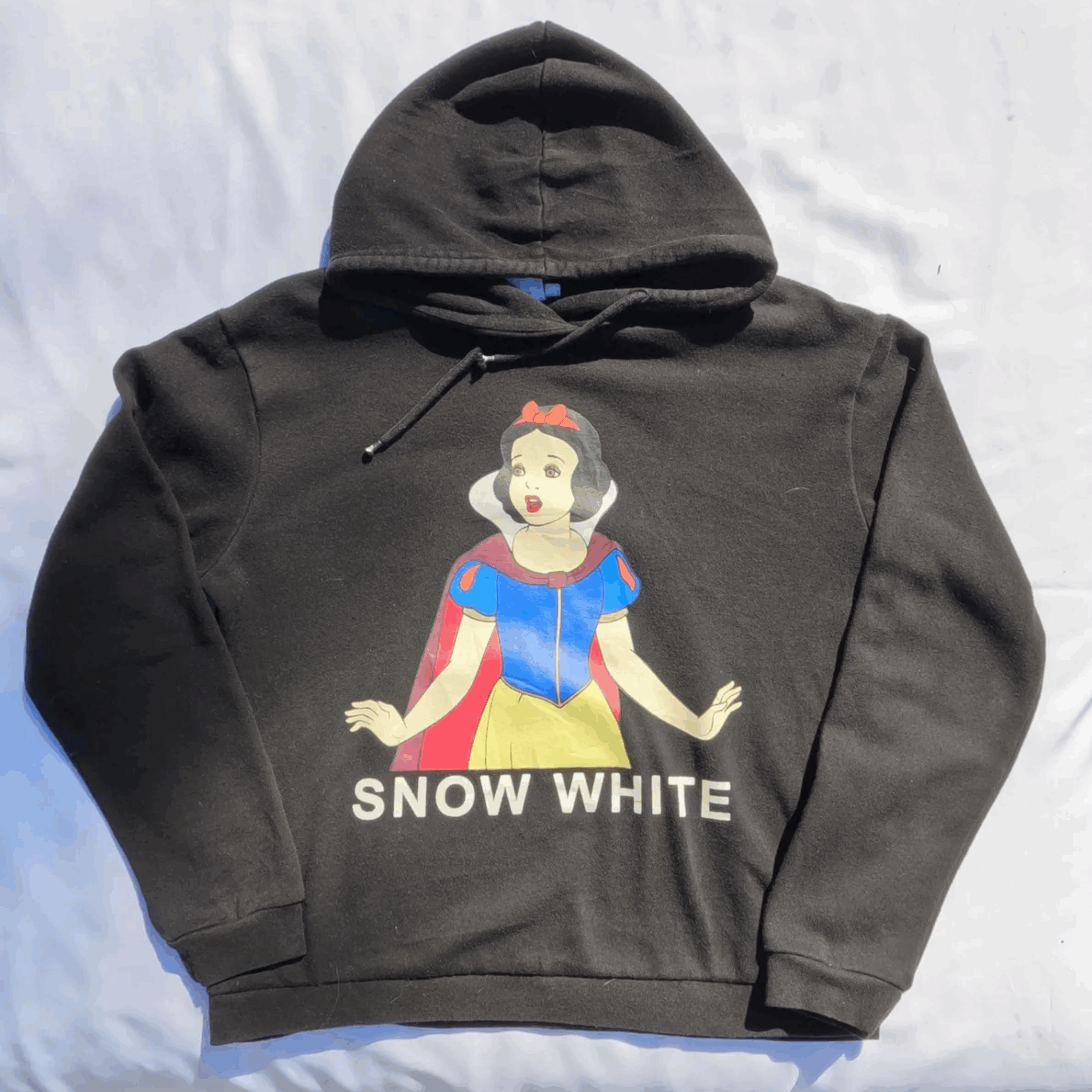 Black Disney hoodie with a large Snow White graphic, size women's extra small.