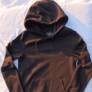 Close-up of a black Jean Pascale hoodie